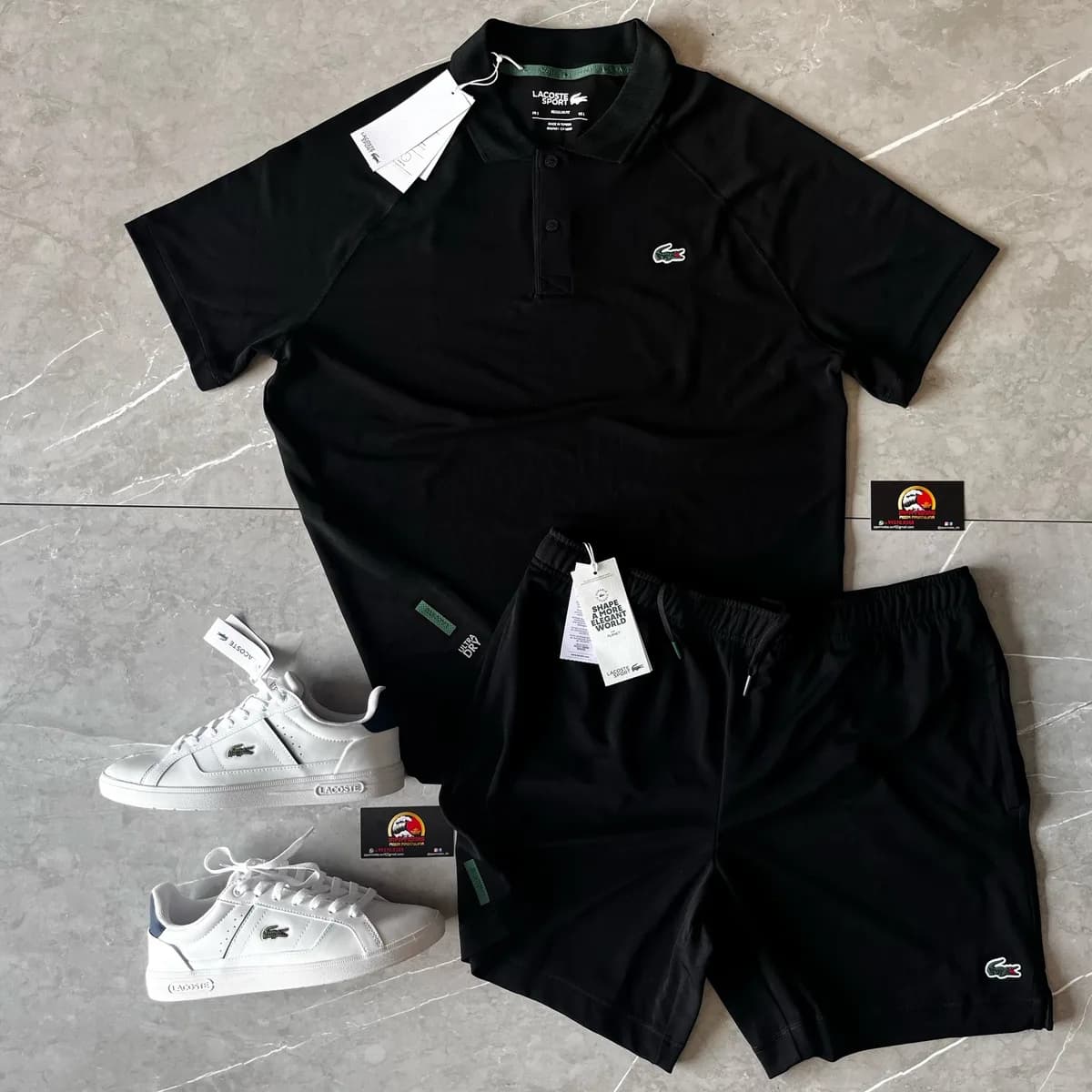 Polo Lacoste preta